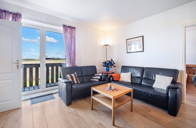 Appartement "4-raum Fw 4" avec jardin partagé, balcon et Wi-Fi
