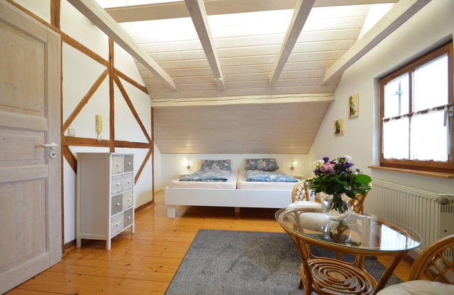 Appartement (70m2) avec jardin et pavillon en bois