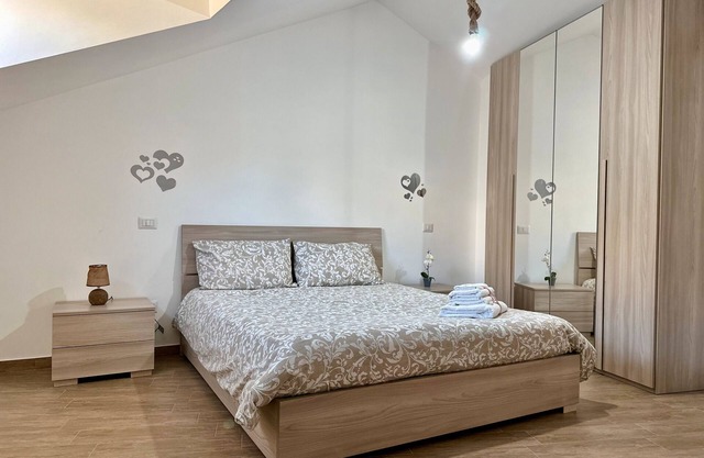 Appartement 'Alba E Tramonto' avec vue sur les montagnes, Wi-Fi et climatisation