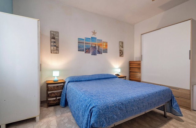Appartement 'Alghero Lido A 100mt Dalla Spiaggia' avec vue sur la mer, balcon et Wi-Fi