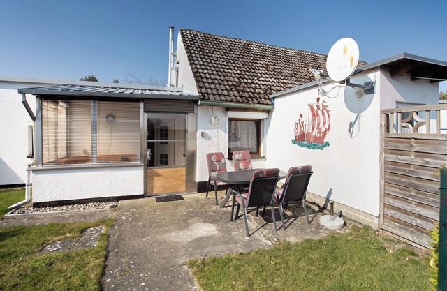 Appartement 'Am Darß - Kogge' avec terrasse privée, jardin privé et Wi-Fi