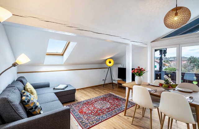 Appartement "Am See" avec vue sur les montagnes, jardin partagé et Wi-Fi.