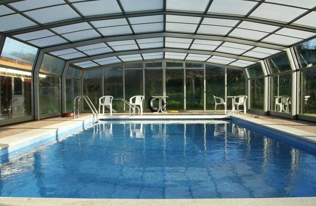 Appartement 'Apartamento 11' avec piscine partagée, terrasse privée et Wi-Fi