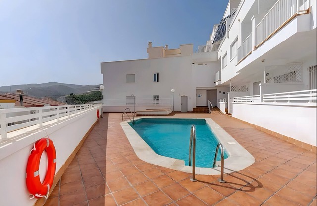 Appartement 'Apartamento Costa Sol' avec piscine partagée, terrasse privée et climatisation