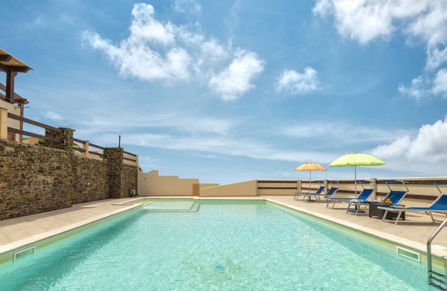 Appartement "App 4 Posti con Terrazza Vista Mare" avec vue mer, piscine, Wi-Fi, jardin et terrasse