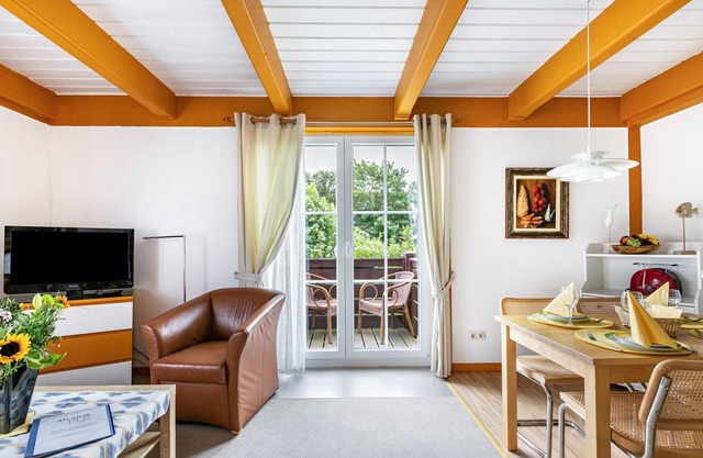 Appartement 'Atlanta 103' avec terrasse partagée, jardin privé et Wi-Fi