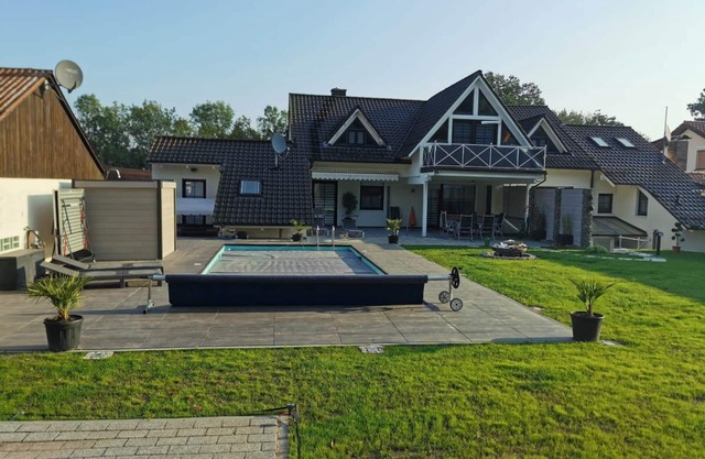 Apartment / attic apartment with balcony, pool, terrace, barbecue and garden.