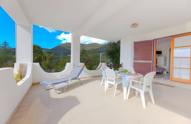 Appartement 'Bilo Nr 14' avec vue sur les montagnes, terrasse privée et jardin partagé