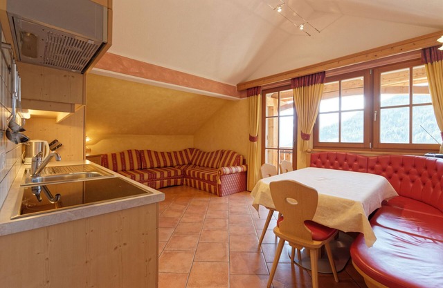 Appartement 'Bruneggerhof 1' avec vue sur les montagnes, jardin privé et Wi-Fi