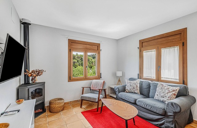 Appartement 'Cal Ton' avec vue montagne, jardin partagé et climatisation
