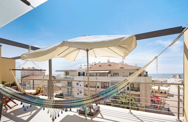 Appartement 'Cantinho Da Praia Da Barra' avec vue sur la mer, piscine partagée et Wi-Fi
