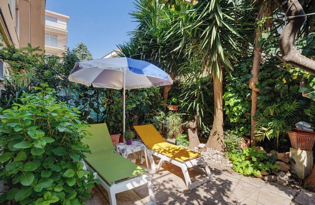 Appartement 'Casa Dei Garofani - Parking gratuit' avec jardin privé