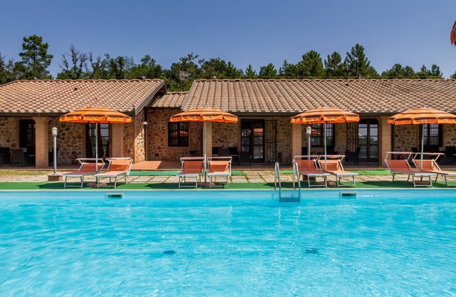 Appartement "Casa Vacanza Il Carpignone 3" avec vue sur le lac et piscine partagée