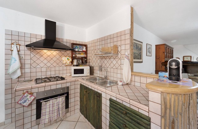 Appartement 'Casa S'arriali' avec vue sur les montagnes, Wi-Fi et climatisation