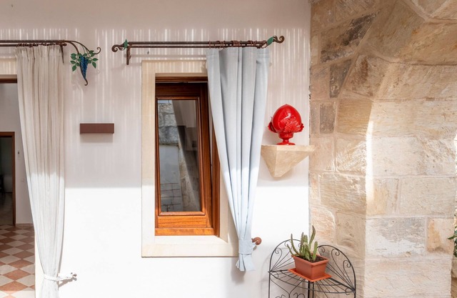 Appartement 'Corte Curatolo - Ciuri' avec terrasse partagée, Wi-Fi et climatisation