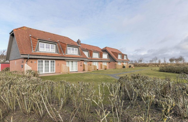 Appartement "Ferienwohnung Nordseeperle" près de la mer avec terrasse