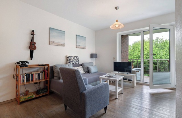 Appartement 'Ferienwohnung Wurster Nordseeküste' avec balcon et Wi-Fi
