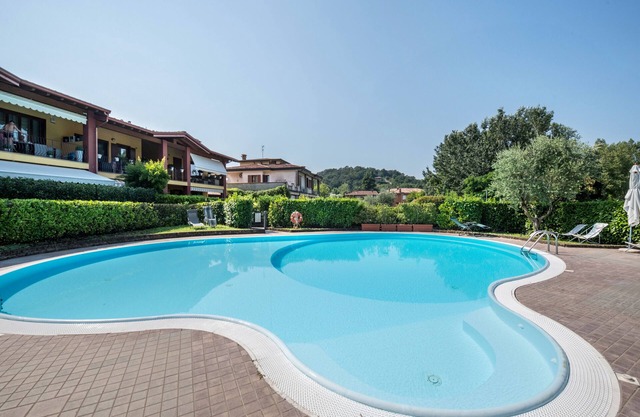 Appartement 'Dimora Del Lago - Oasi Con Piscina' avec piscine partagée, Wi-Fi et climatisation