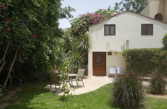 Appartement duplex avec jardin privé, vue sur les palmiers, à 4 km du Sphinx.