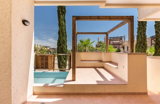 Appartement 'El Oasis Martinica 8 Bajo A' avec piscine partagée, Wi-Fi et climatisation