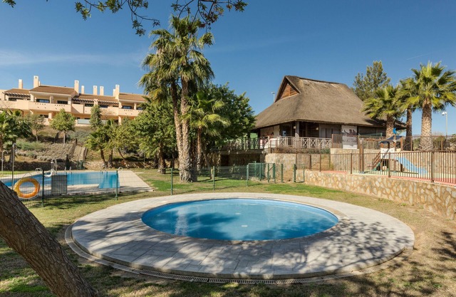 Appartement 'El Oasis Martinica 2 Bajo B' avec piscine privée, Wi-Fi et climatisation