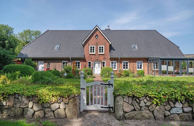 Appartement 'Ferienwohnung Bi-anne-to-huus' avec terrasse privée, jardin privé et Wi-Fi