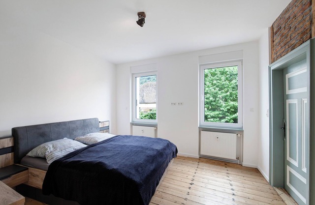 Appartement 'Ferienwohnung Rheinschlendern' avec terrasse partagée et Wi-Fi