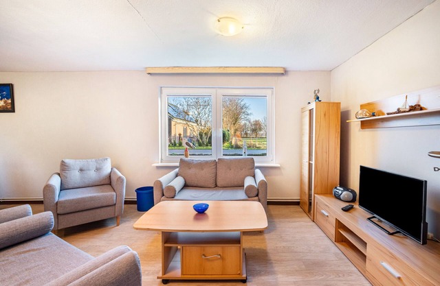 Appartement "Ferienhaus Peters" avec terrasse privée, jardin partagé et Wi-Fi