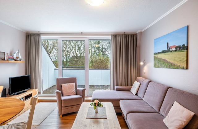 Appartement 'Ferienhof Paulsen - Kiebitz' avec balcon et Wi-Fi
