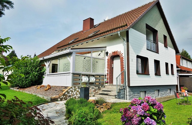 Appartement "Ferienwohnung Schiller" avec jardin partagé, balcon et Wi-Fi