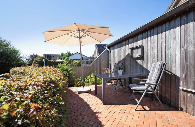 Appartement 'Ferienwohnung Sönksen' avec terrasse partagée et Wi-Fi