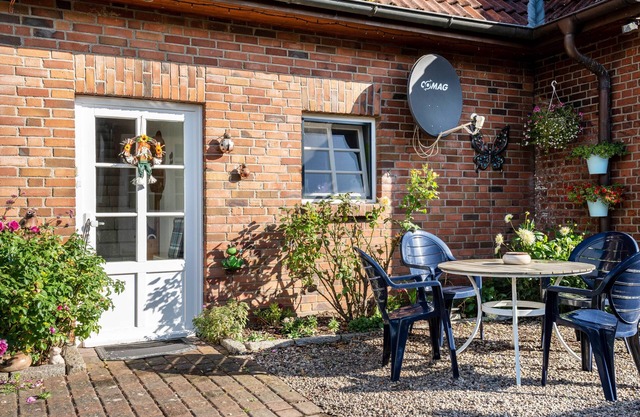 Appartement "Ferienwohnung Wittensee" avec terrasse partagée, jardin privé et Wi-Fi