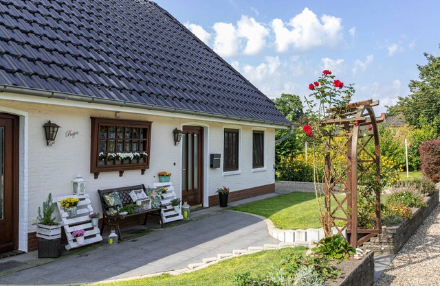 Appartement 'Ferienwohnung Butjes' avec terrasse privée, jardin partagé et Wi-Fi