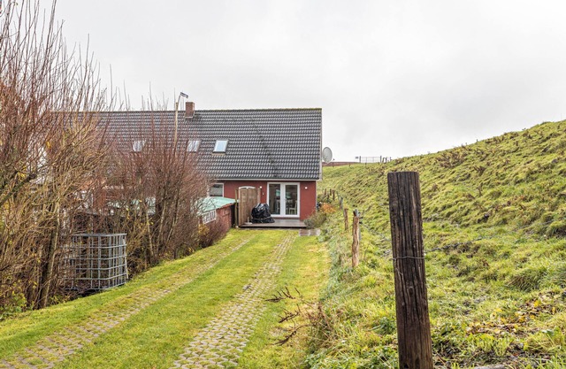 Appartement "Ferienwohnung Deich" avec jardin privé et Wi-Fi