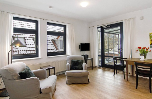 Appartement 'Ferienwohung 1' avec terrasse privée, balcon et Wi-Fi