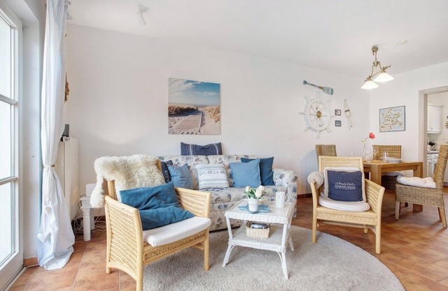 Appartement 'Fewo Yachthafenblick Nr 5' avec vue sur la mer, terrasse privée et Wi-Fi