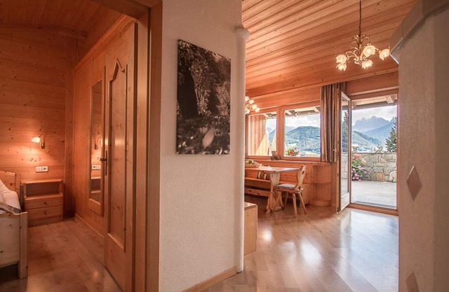 Appartement pour 2-4 personnes avec une grande terrasse et sauna ainsi qu'un poêle en faïence