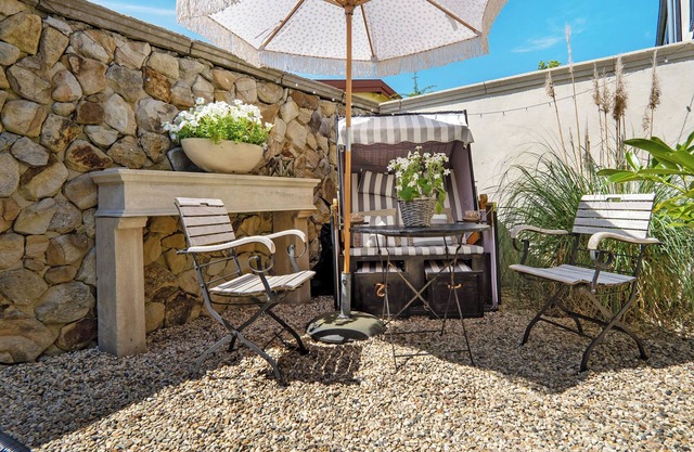 Appartement 'Gästewohnung Am See - Suite Maritim' avec terrasse privée, jardin privé et Wi-Fi
