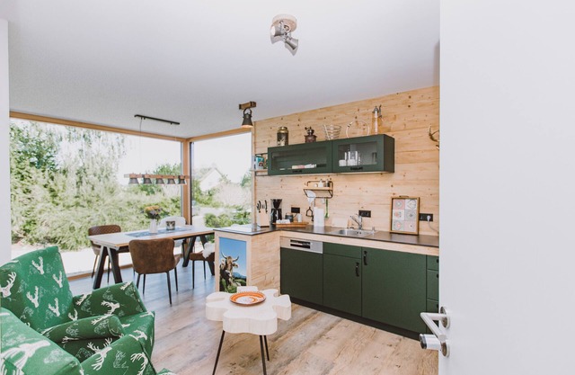 Appartement 'Garden - Guggi's Emporeon Allgäu' avec terrasse partagée, Wi-Fi et climatisation