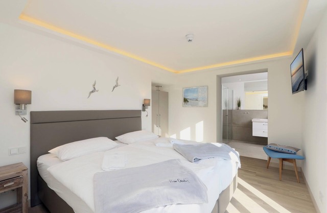 Appartement "Gardensuite Binz" avec piscine, Wi-Fi et terrasse