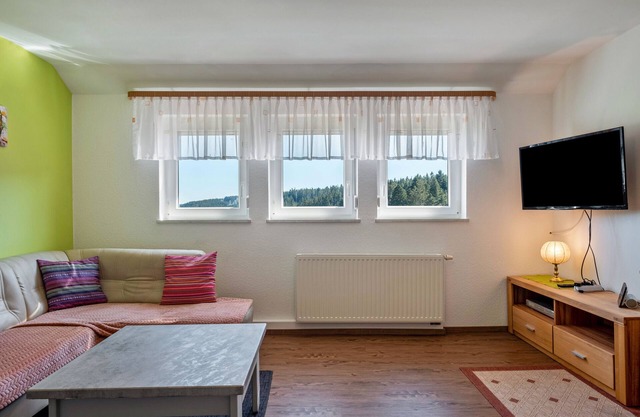 Appartement "Gartenblick" avec vue sur les montagnes, terrasse privée et Wi-Fi