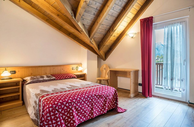 Appartement 'Giongo Residence Aparthotel 104' avec vue sur la montagne, terrasse partagée et Wi-Fi