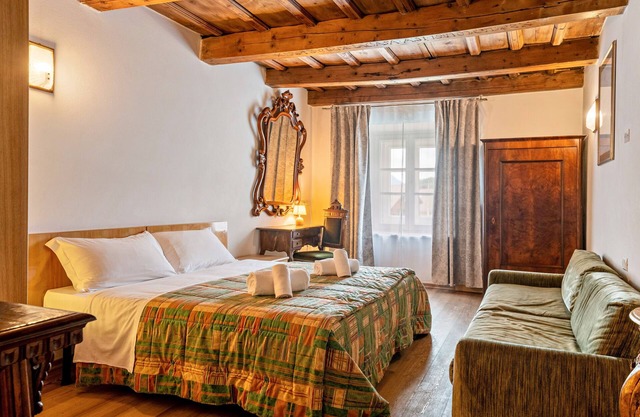Appartement 'Gran Deluxe Ciasa Soldà - Apt 10' avec vue sur la montagne, jardin partagé et Wi-Fi