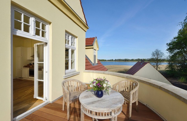 Appartement 'Gut Grubnow Rügen - Ferienwohnung 7' avec vue sur lac, jardin partagé et Wi-Fi