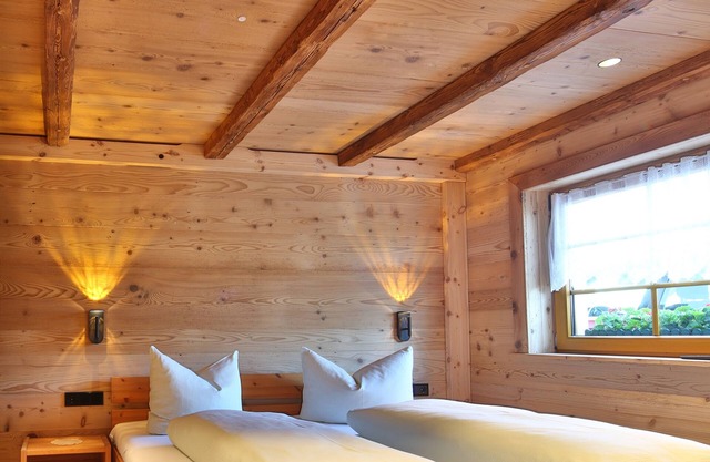 Appartement "Hüttenstüble" avec vue sur les montagnes, jardin partagé et Wi-Fi