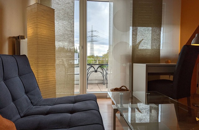 Appartement 'Haus Abendsonne Dachgeschoss Klein' avec jardin partagé, balcon et Wi-Fi