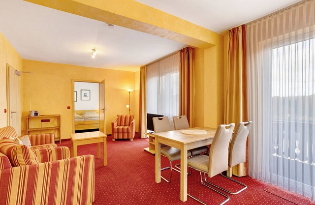 Appartement 'Haus Erika - Ferienwohnung 1' avec jardin partagé, balcon et Wi-Fi