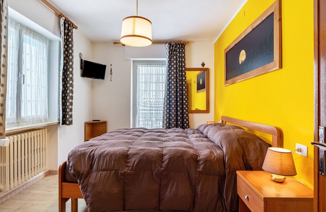 Appartement "House Cuel Milena Folgaria - Yellow" avec vue sur la montagne et jardin partagé