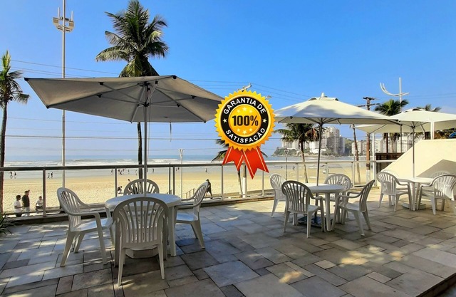 Apt à Guarujá, en bord de mer, service de plage, wifi, climatisation, garage