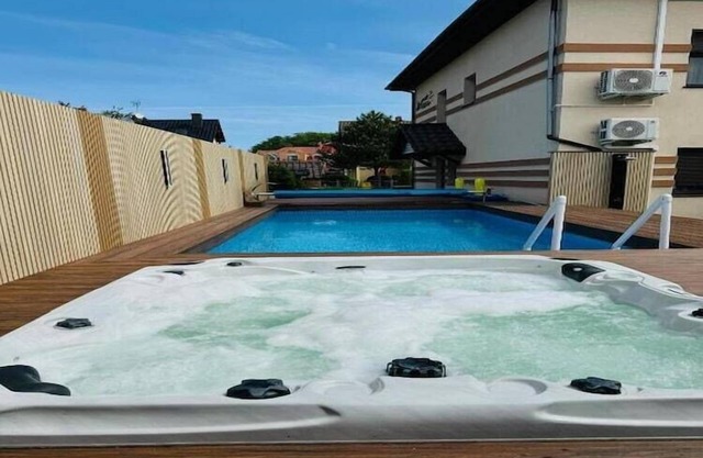 Appartement confortable avec piscine, Miedzywodzie